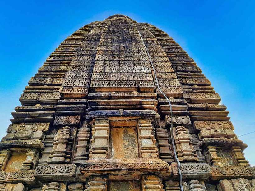 Carved stone tower of an old temple at Barsur