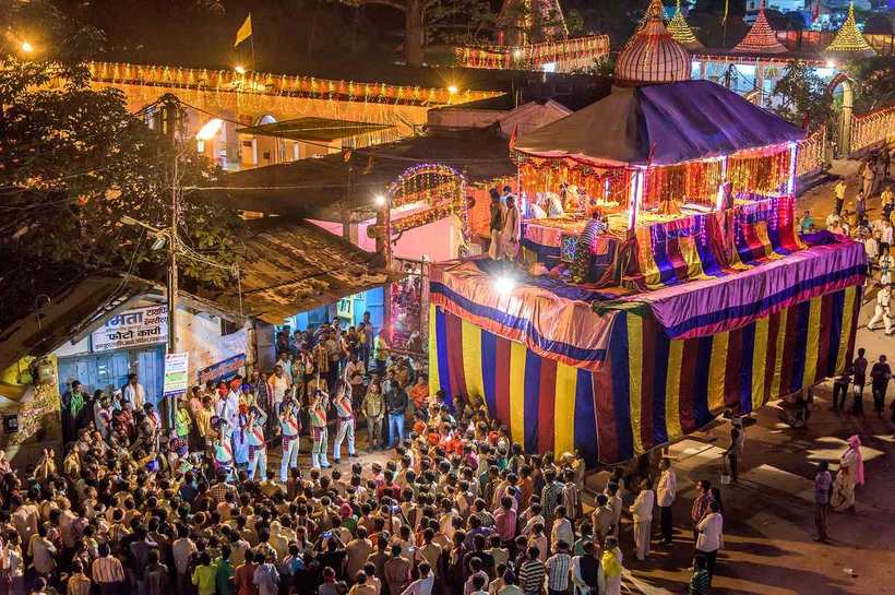 Crowds gathered at night during the Bastar Dussehra festival in Jagdalpur