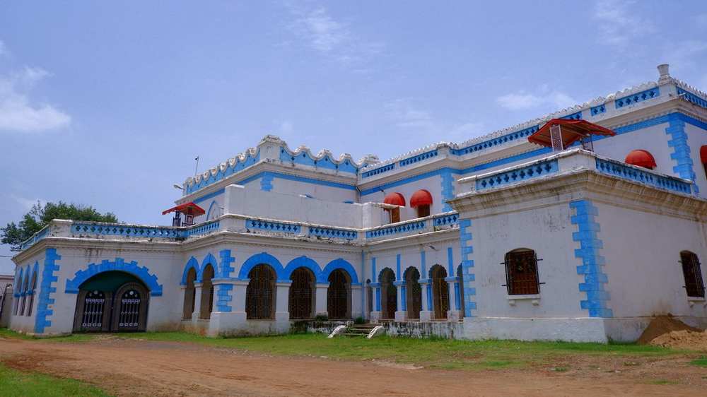 The blue and white frontage of Bastar Palace in Jagdalpur